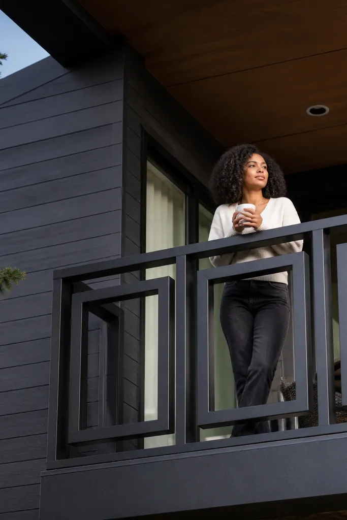 Railing with large square openings framed by thick black border bars