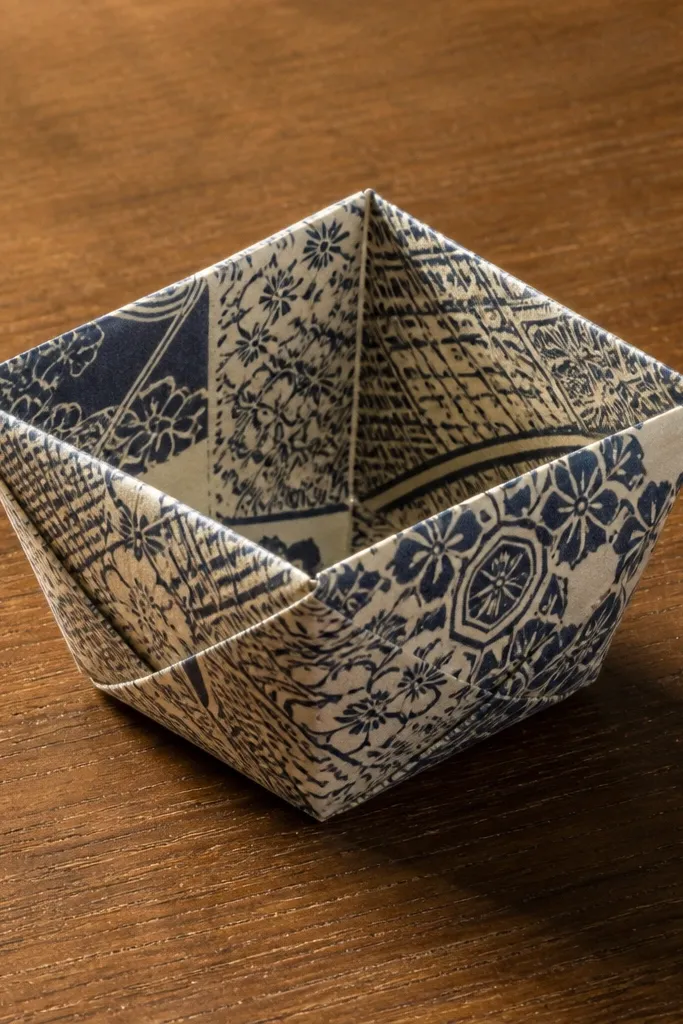 Bold patterned square paper with traditional geometric designs