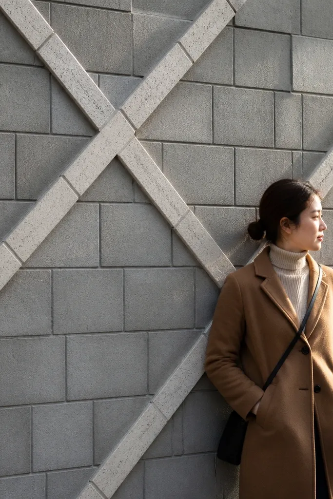 Patterned block wall with diagonal tile accents creating an X effect