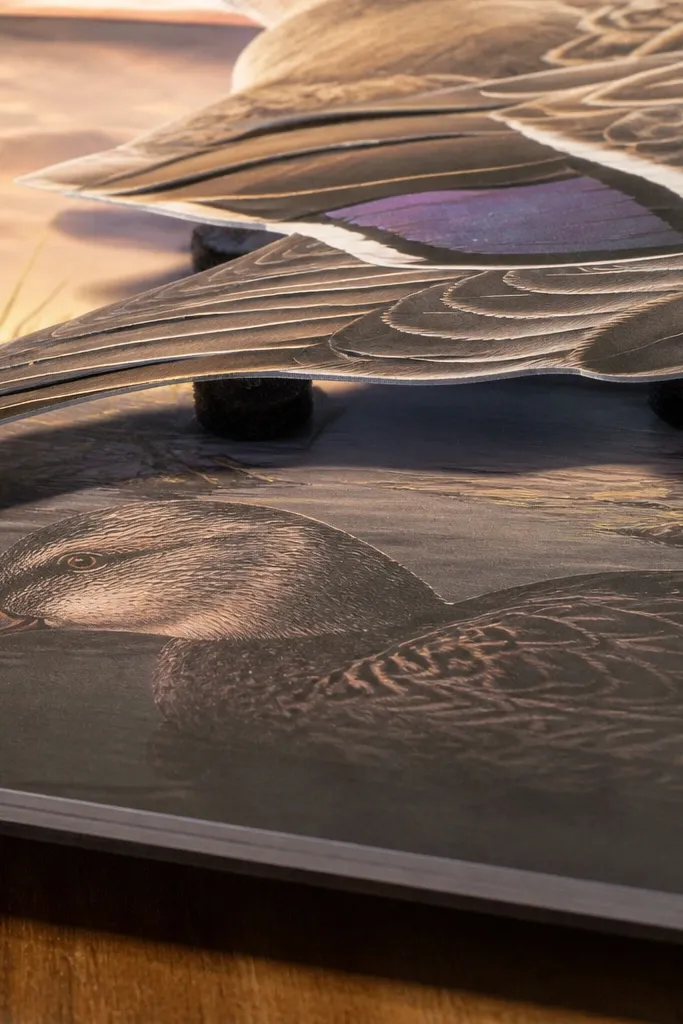 Black felt pads with adhesive backing on a craft table