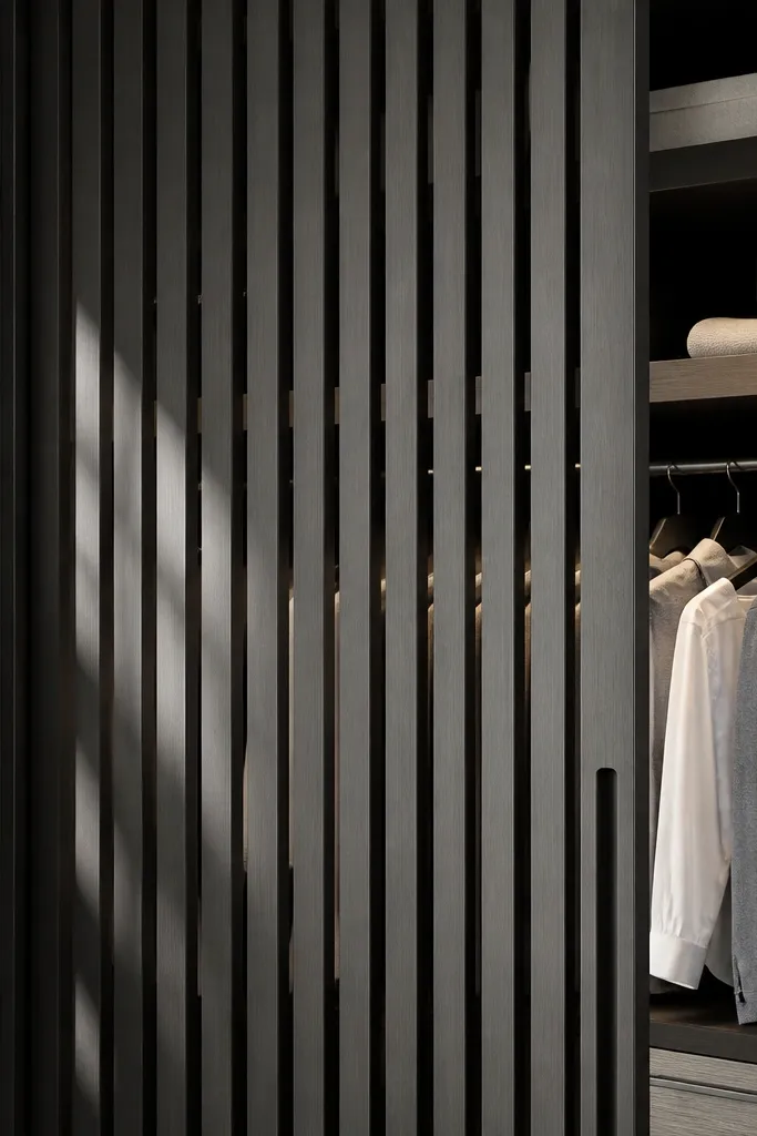 White sliding door with thin vertical slats and a clean top rail
