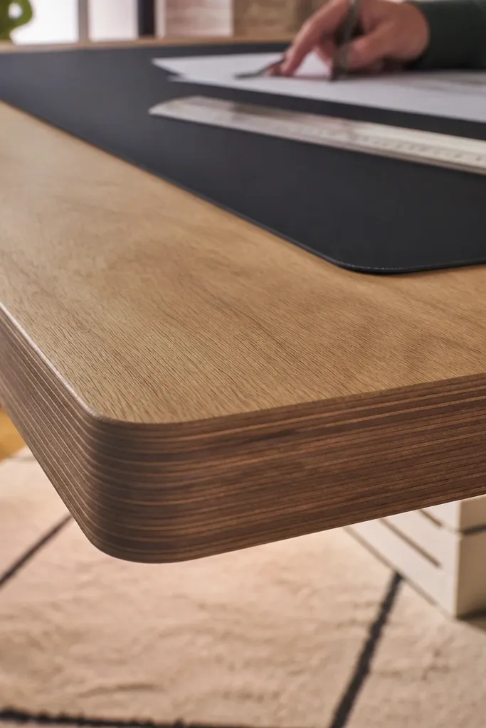 Plywood desk with stained top and neat edge banding