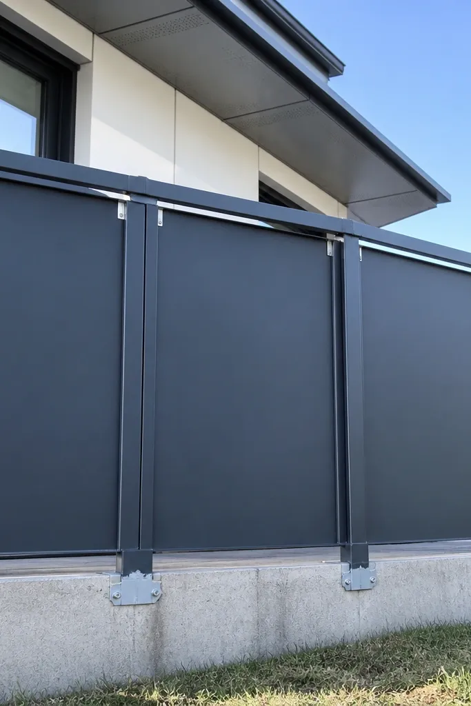 Uneven railing bays where panels look stretched and misaligned