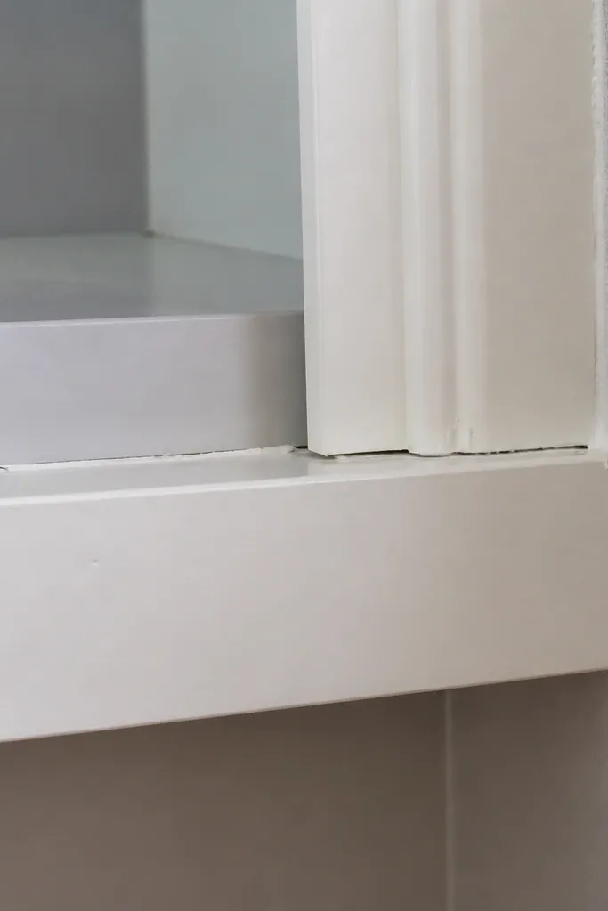 Trim installed on a misaligned frame with visible uneven seams