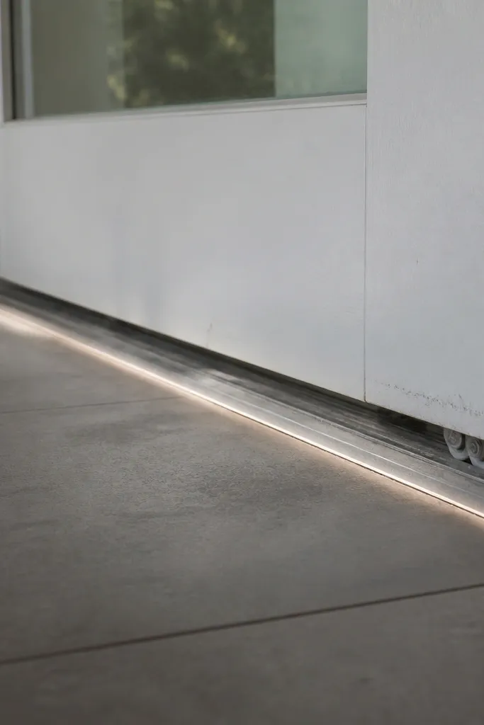 Sliding door rubbing the bottom edge with a slightly misaligned roller