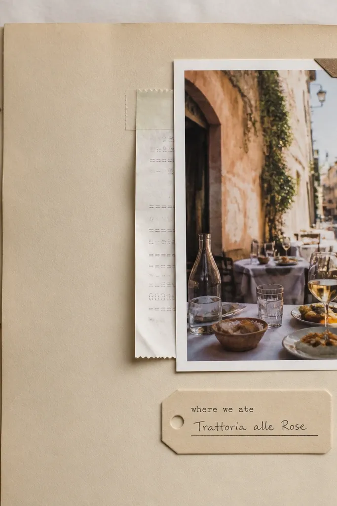 A light tan page with a photo corner at the top right holding a 2x3 photo. A receipt is taped behind the photo corner so it peeks out along the left edge. A small tag at the bottom reads "where we ate" with a handwritten restaurant name.