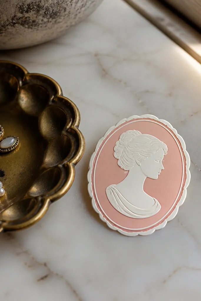 Pink cameo medallion with a profile silhouette