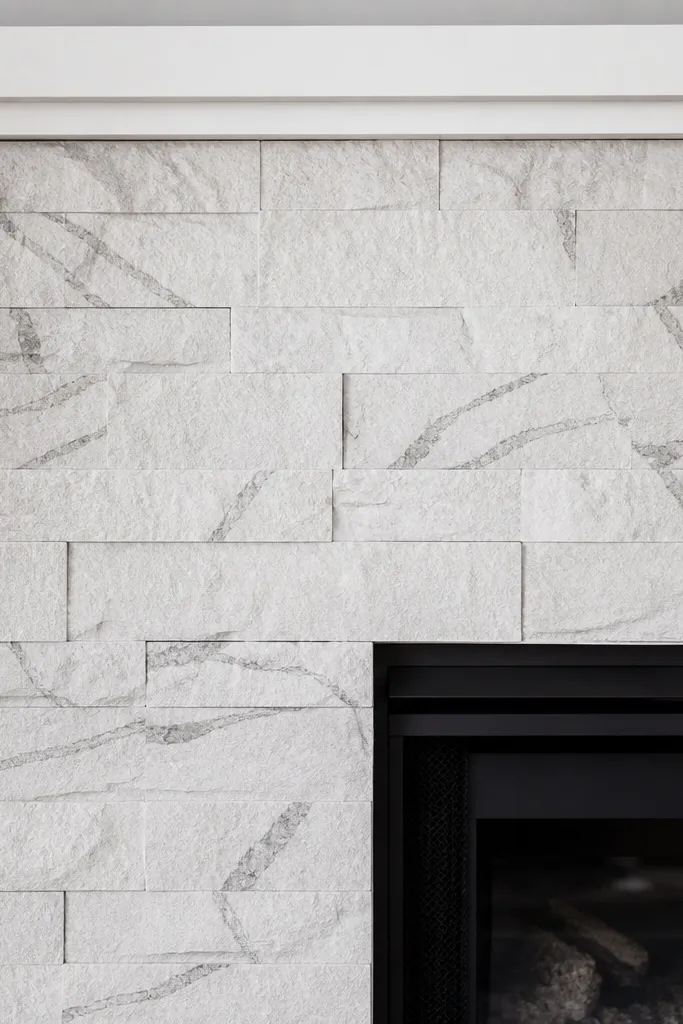 Pearl white stone with thin gray vein lines in some areas