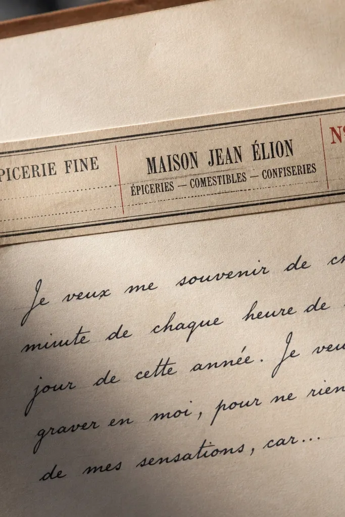 Vertical French-style label strip with aged brown text