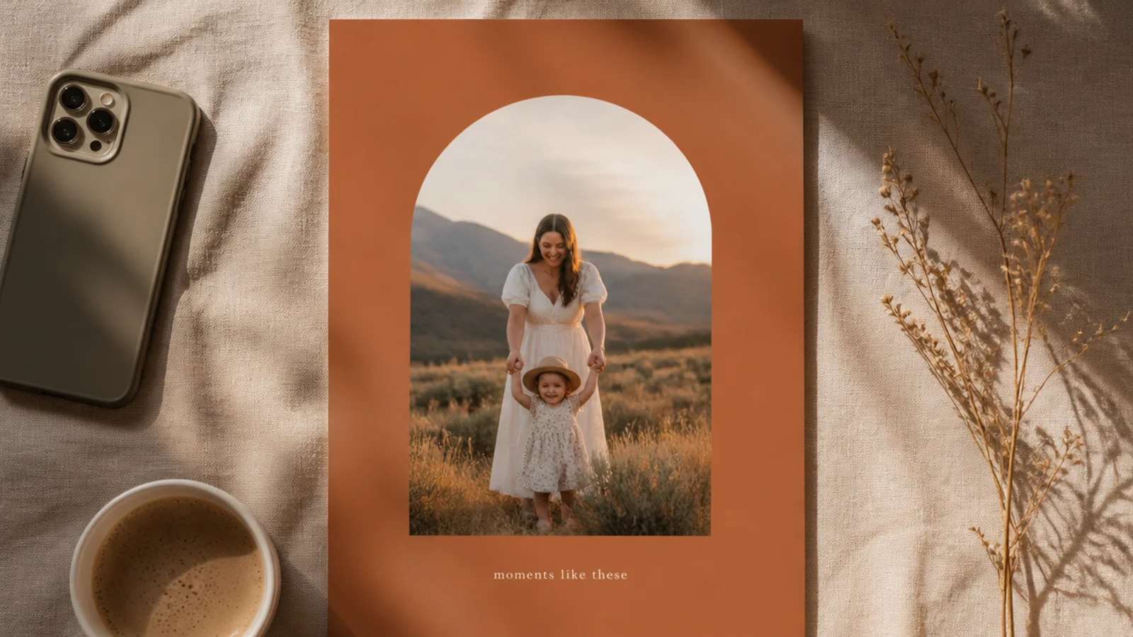 A photo cropped into a tall arch, centered on a terracotta background with a small caption below.