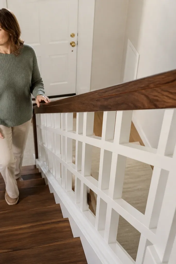 Walnut handrail with painted grid balusters