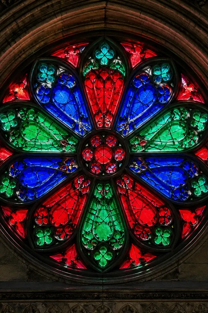 Stained glass with bold colored panels and sunlit glow