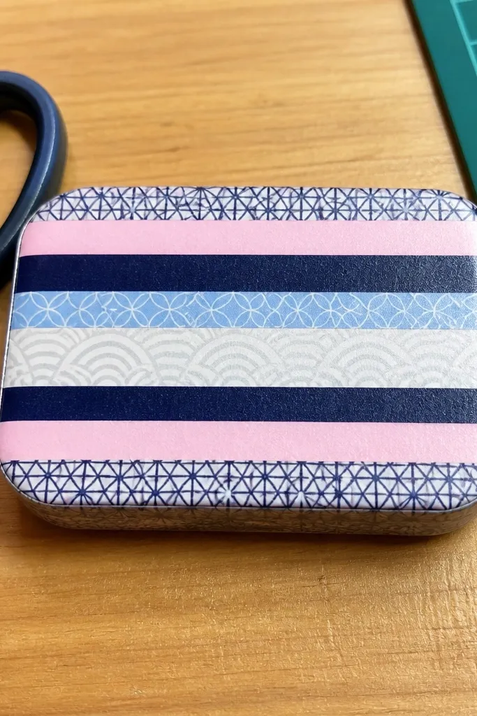 Washi tape stripe cover with sealed edges and a neat front closure tab.
