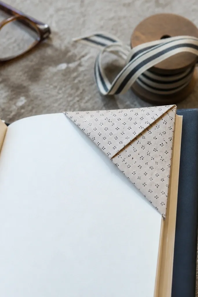 Slim bookmark with a folded corner pocket