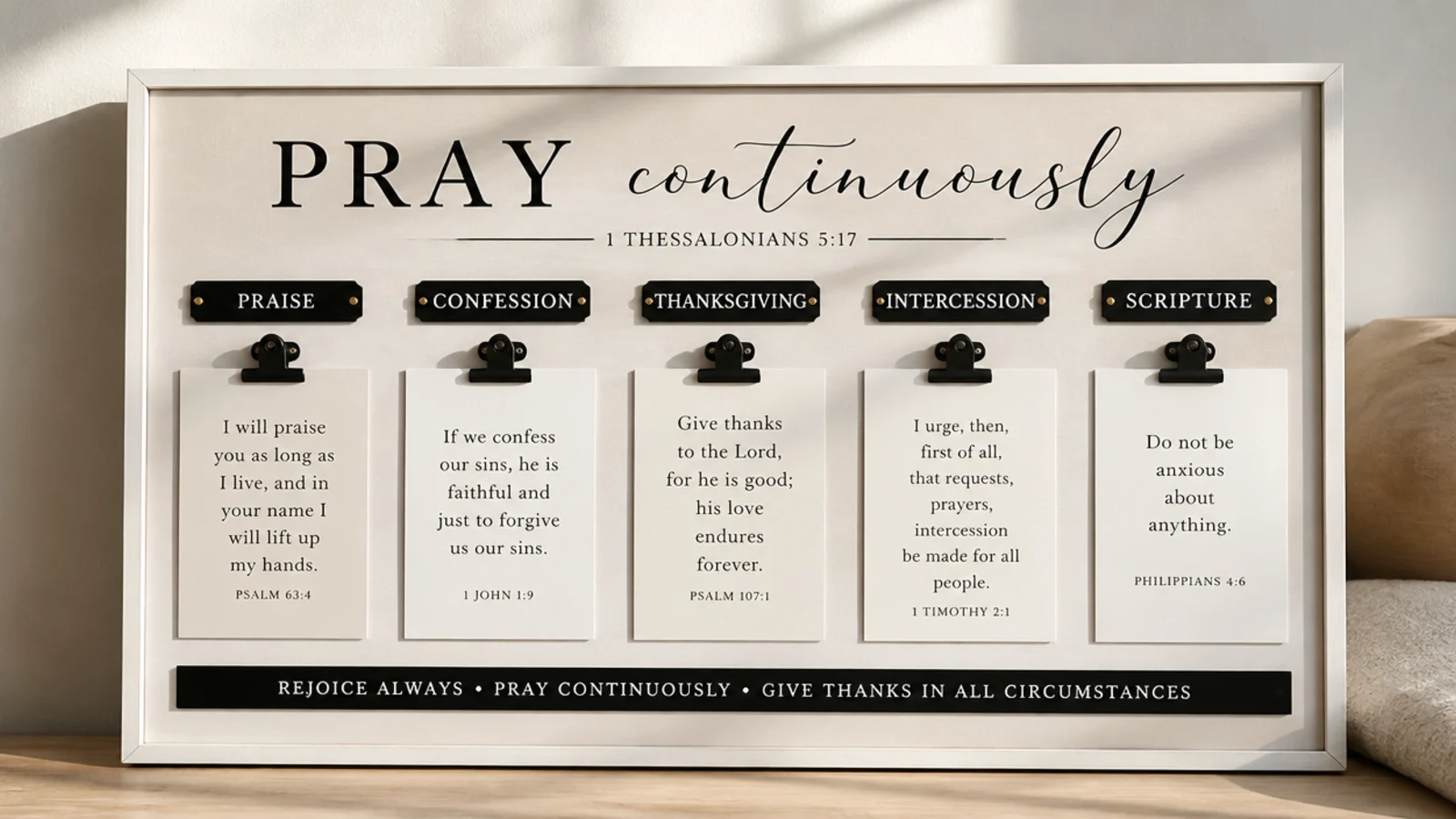 A striking board using only black, white, and cream with bold typographic verse cards.