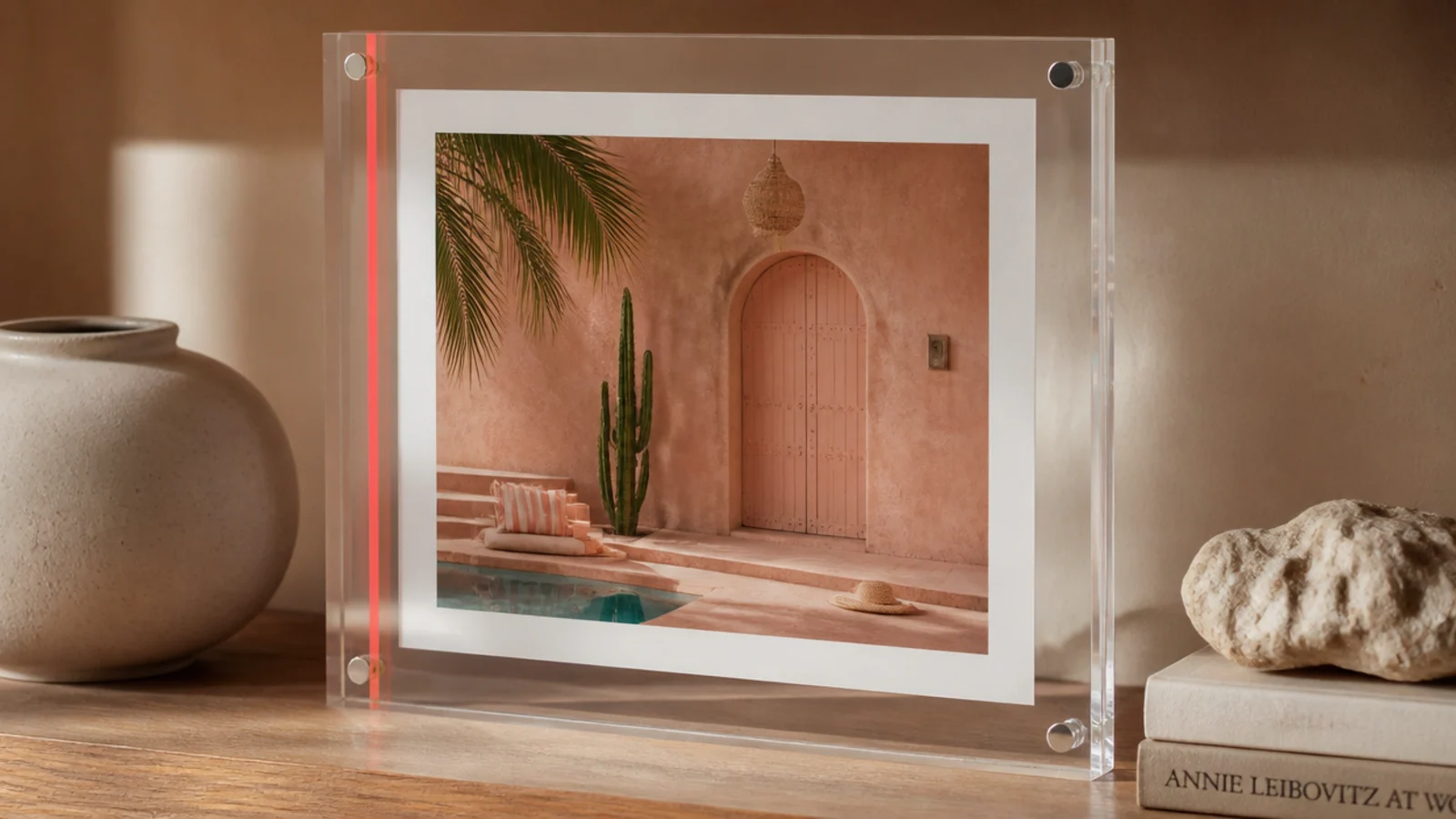 A clear resin frame with a single bold stripe of neon pigment running through one side of the border.