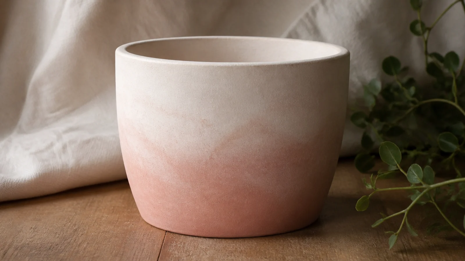 A small pot with a soft blush-to-white gradient, blush at the bottom fading upward, blended with a sponged texture.