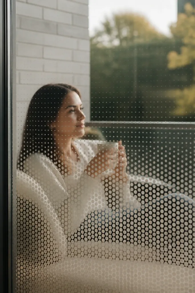 Glass panels with a subtle dot ceramic pattern