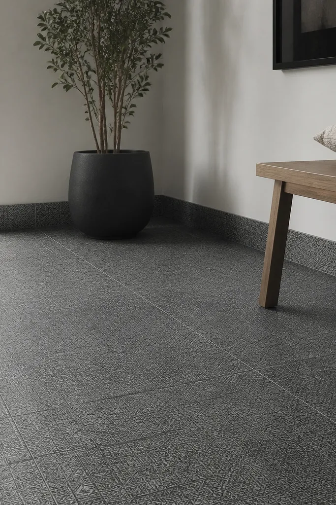 Monochrome micro-pattern floor tile with matching base trim