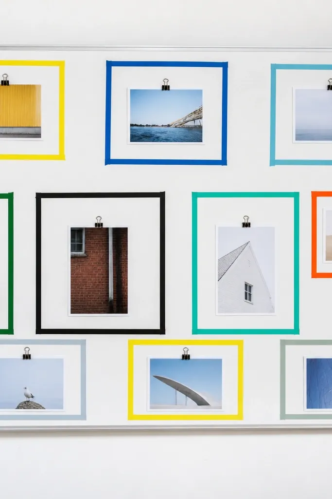 Whiteboard panel with tape-framed collage in neat rectangles