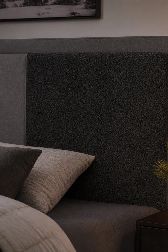 Grey headboard with a fabric panel that can be swapped in sections